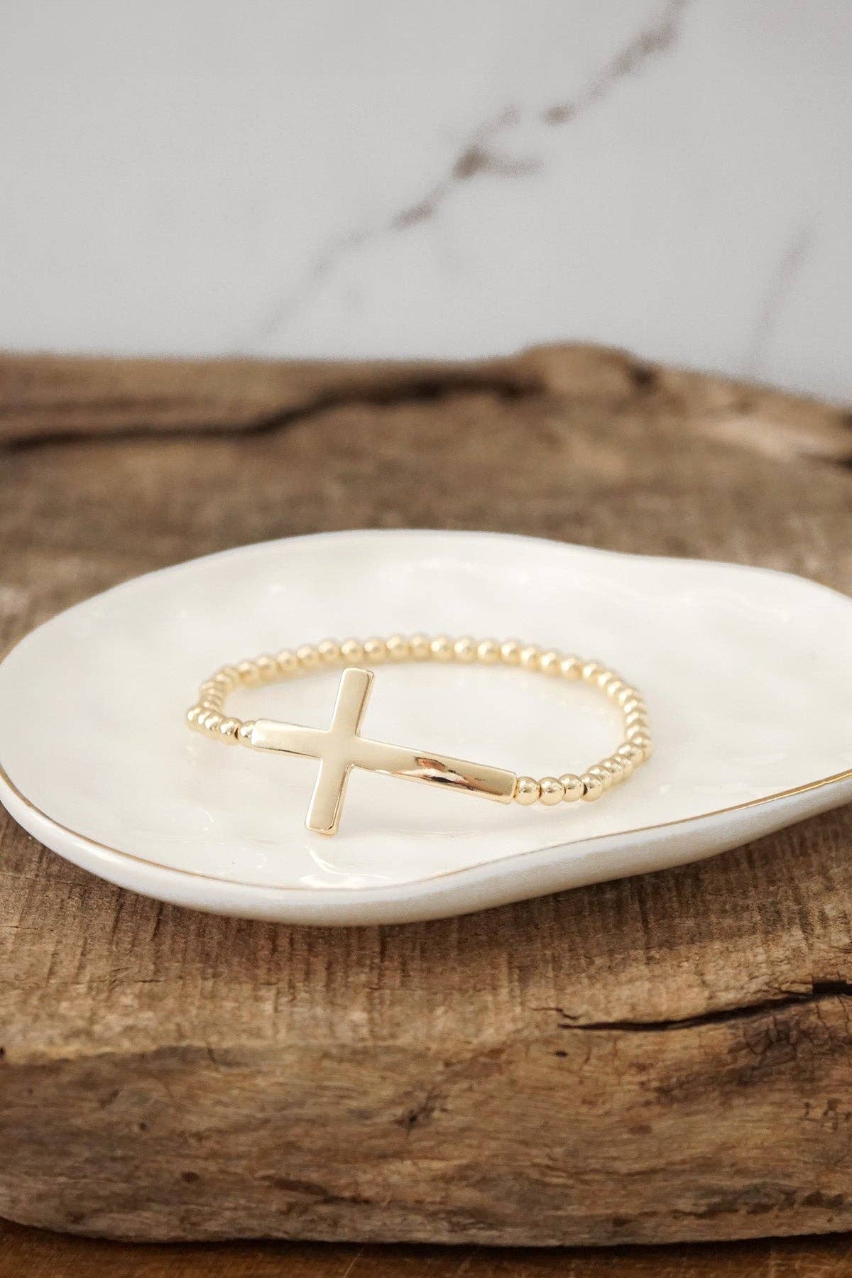 Worn Gold Cross Bracelet