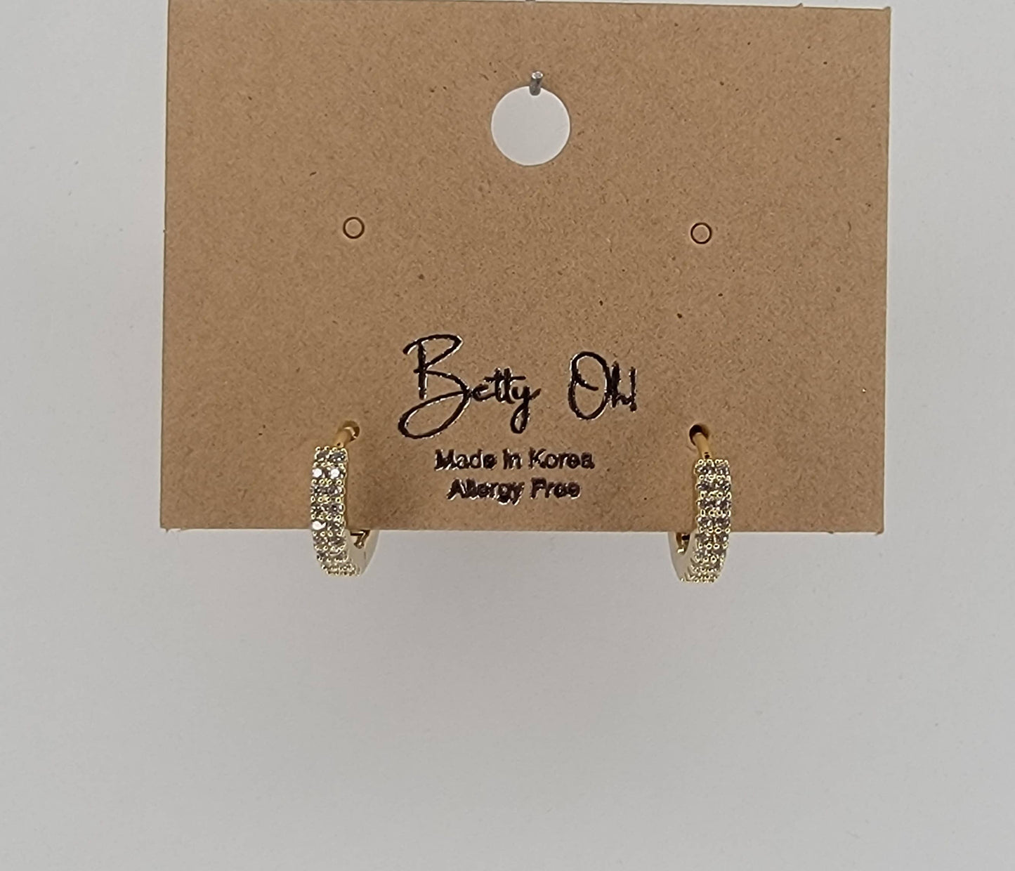 CZ CLICKER EARRINGS.
