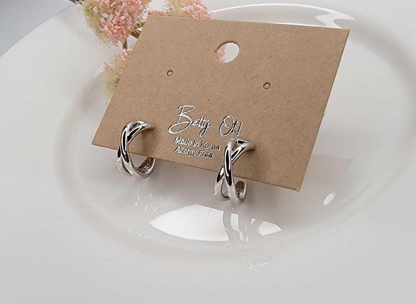 X-CROSS HOOP EARRINGS.