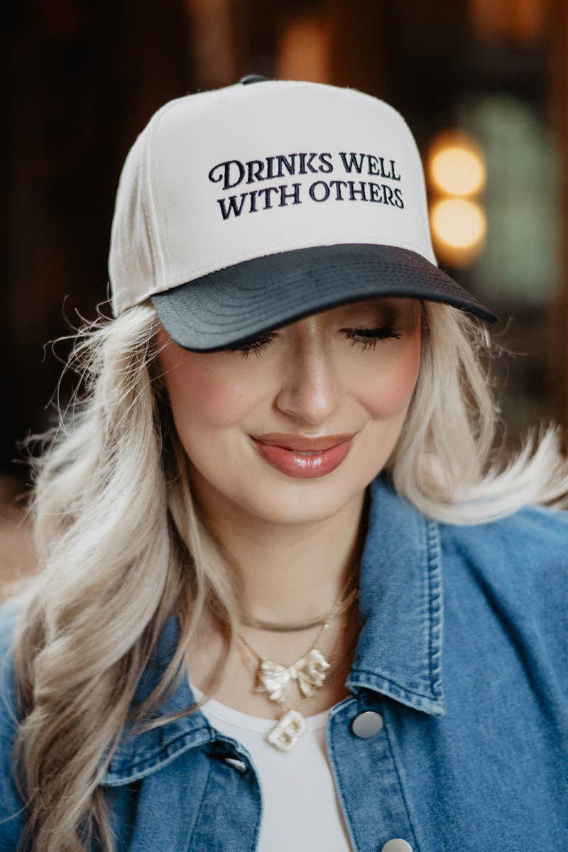 Drinks Well Trucker Hat