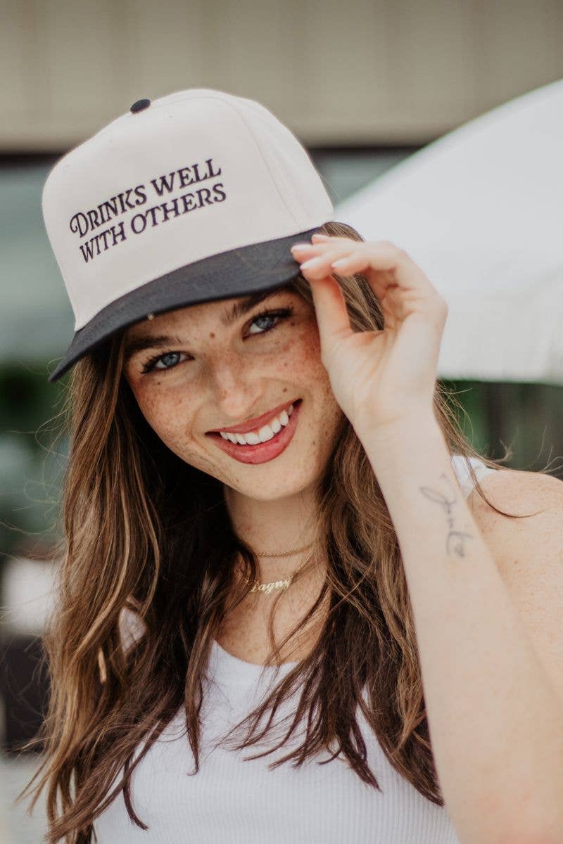 Drinks Well Trucker Hat