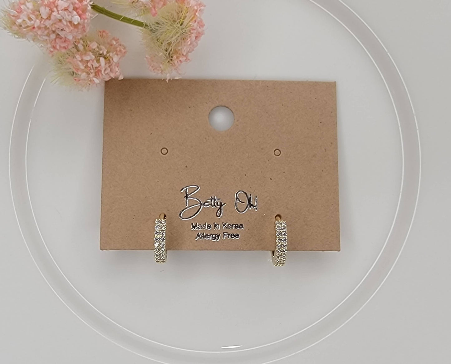 CZ CLICKER EARRINGS.