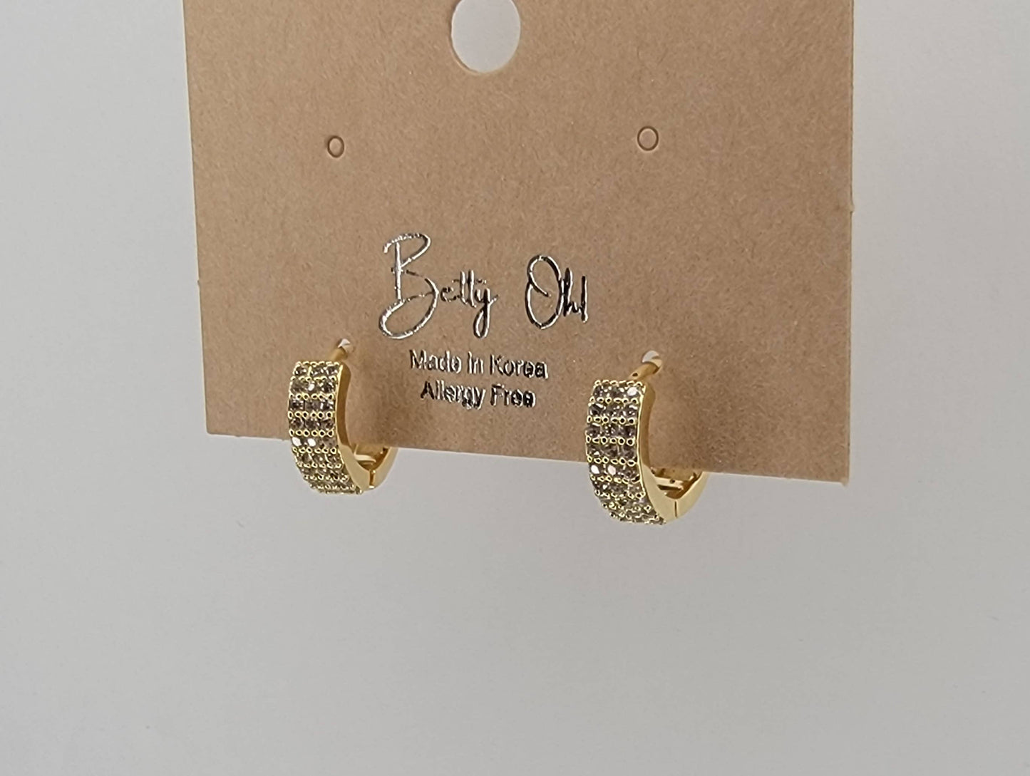 CZ SMALL CLICKER EARRINGS.