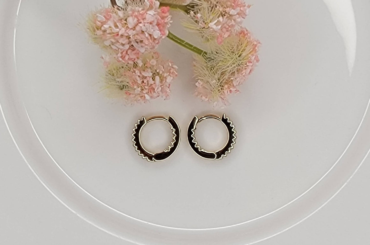 CZ CLICKER EARRINGS.