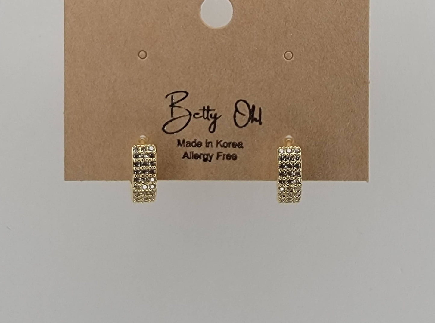 CZ SMALL CLICKER EARRINGS.