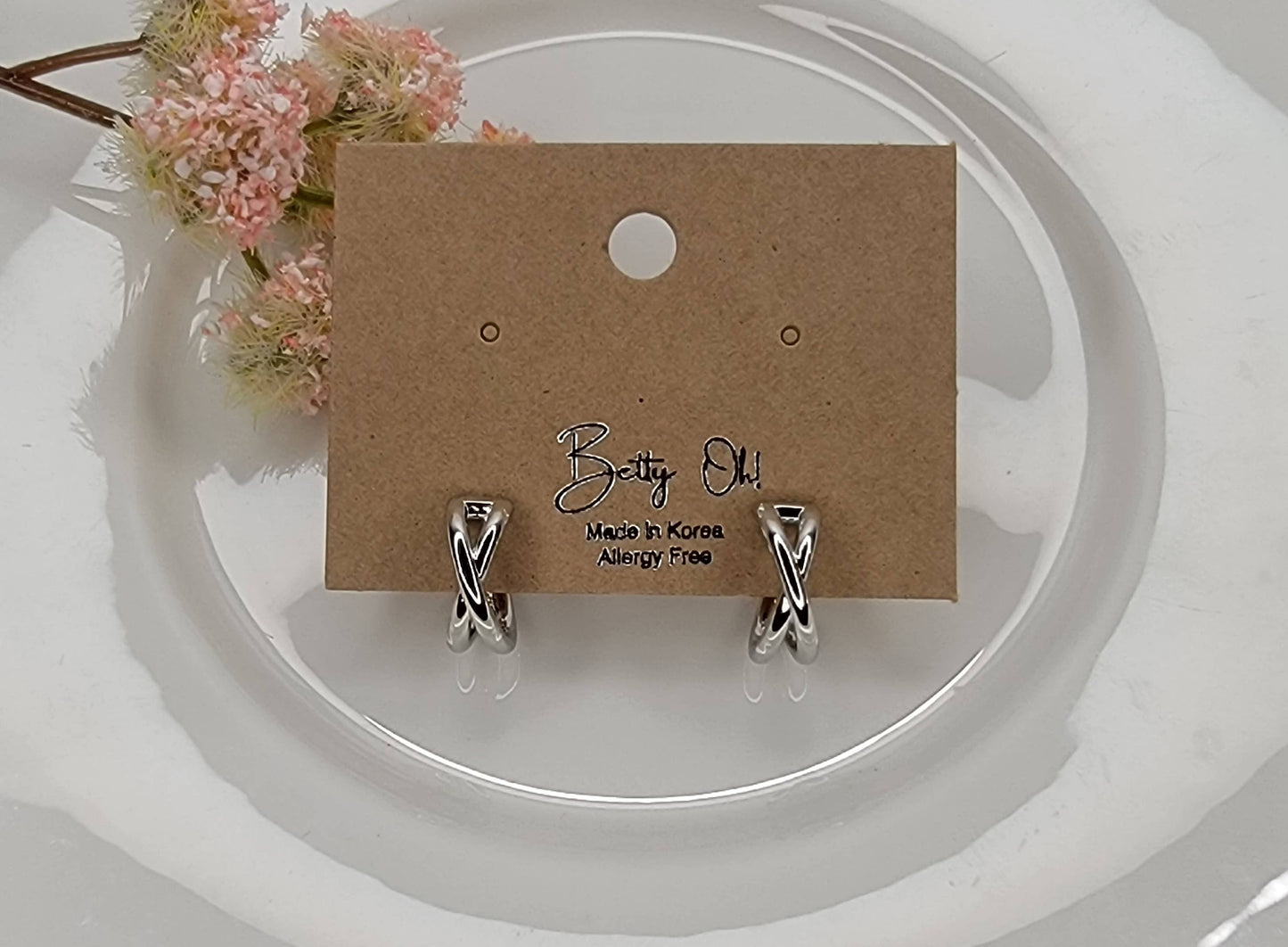 X-CROSS HOOP EARRINGS.