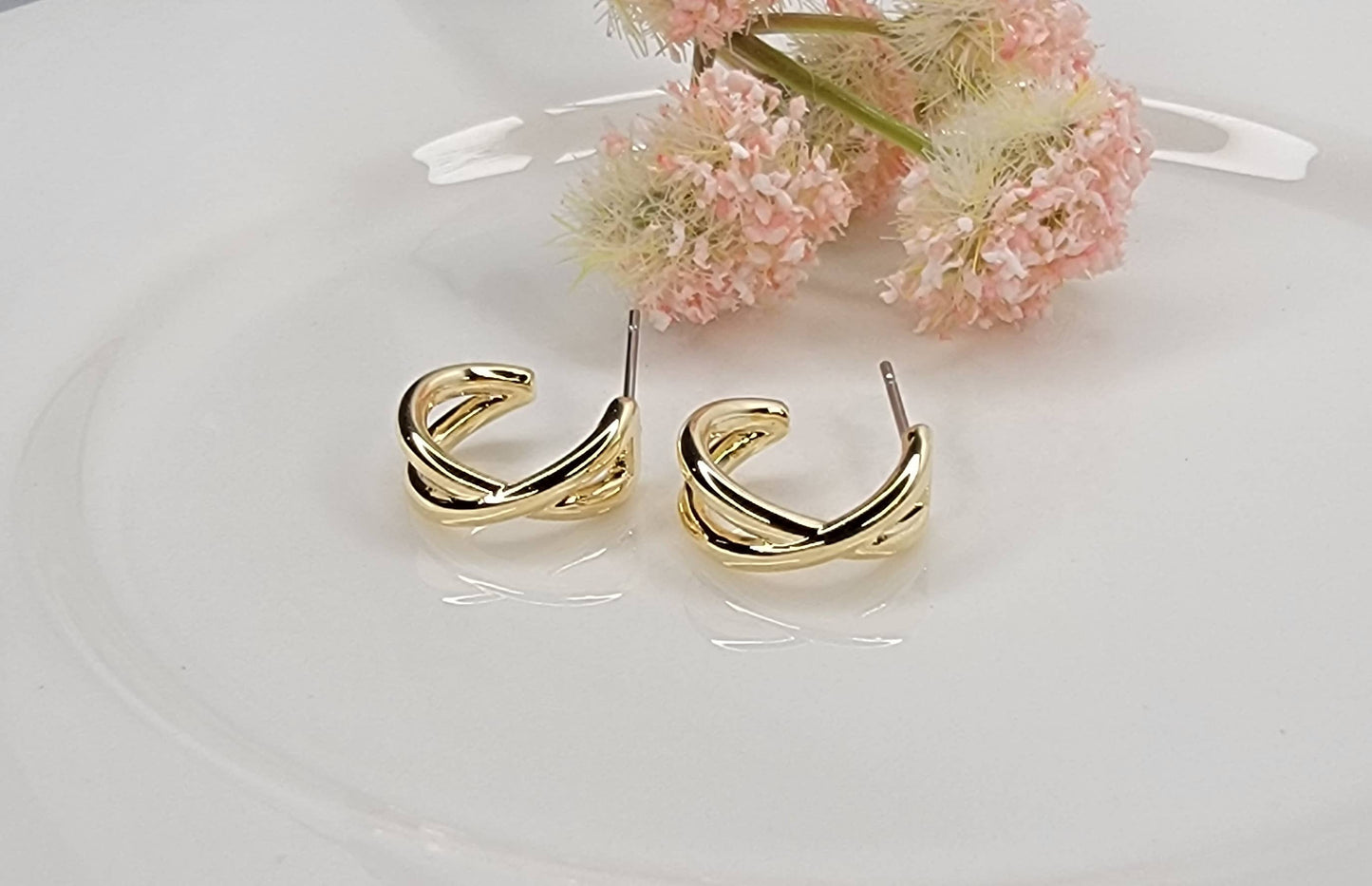 X-CROSS HOOP EARRINGS.