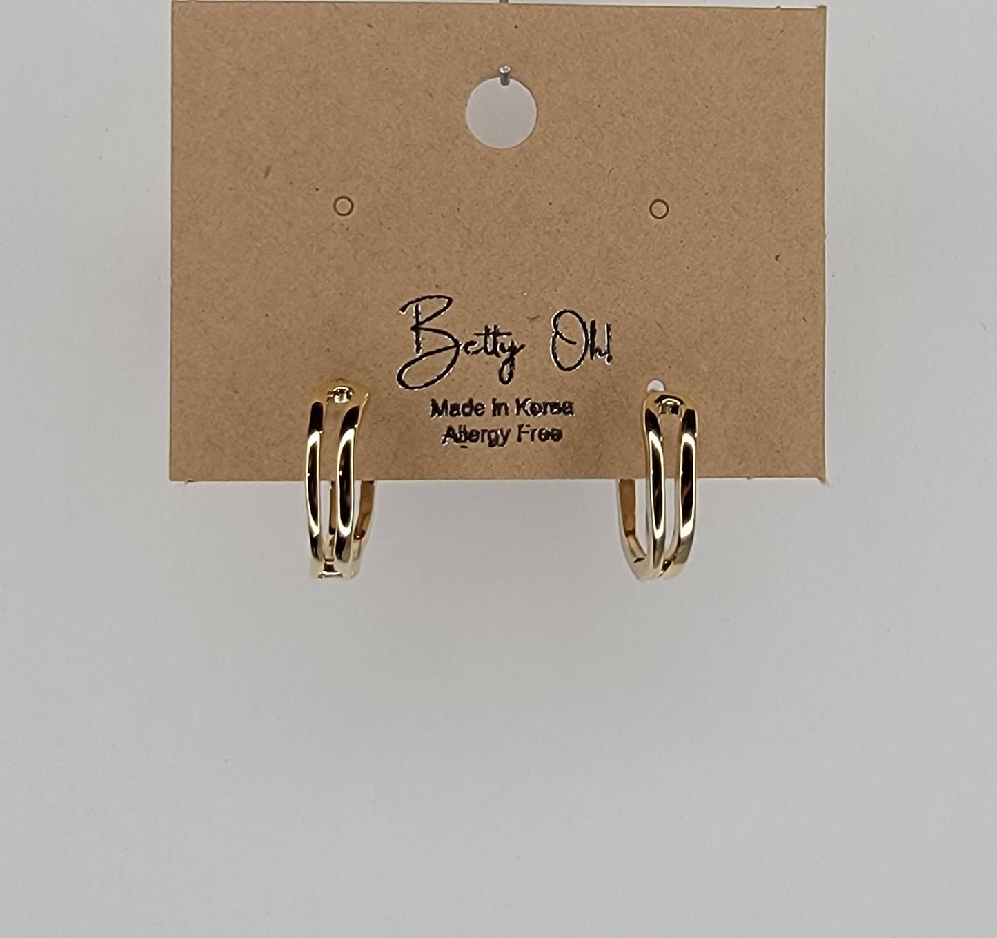 DOUBLE LINED CLICKER EARRINGS.