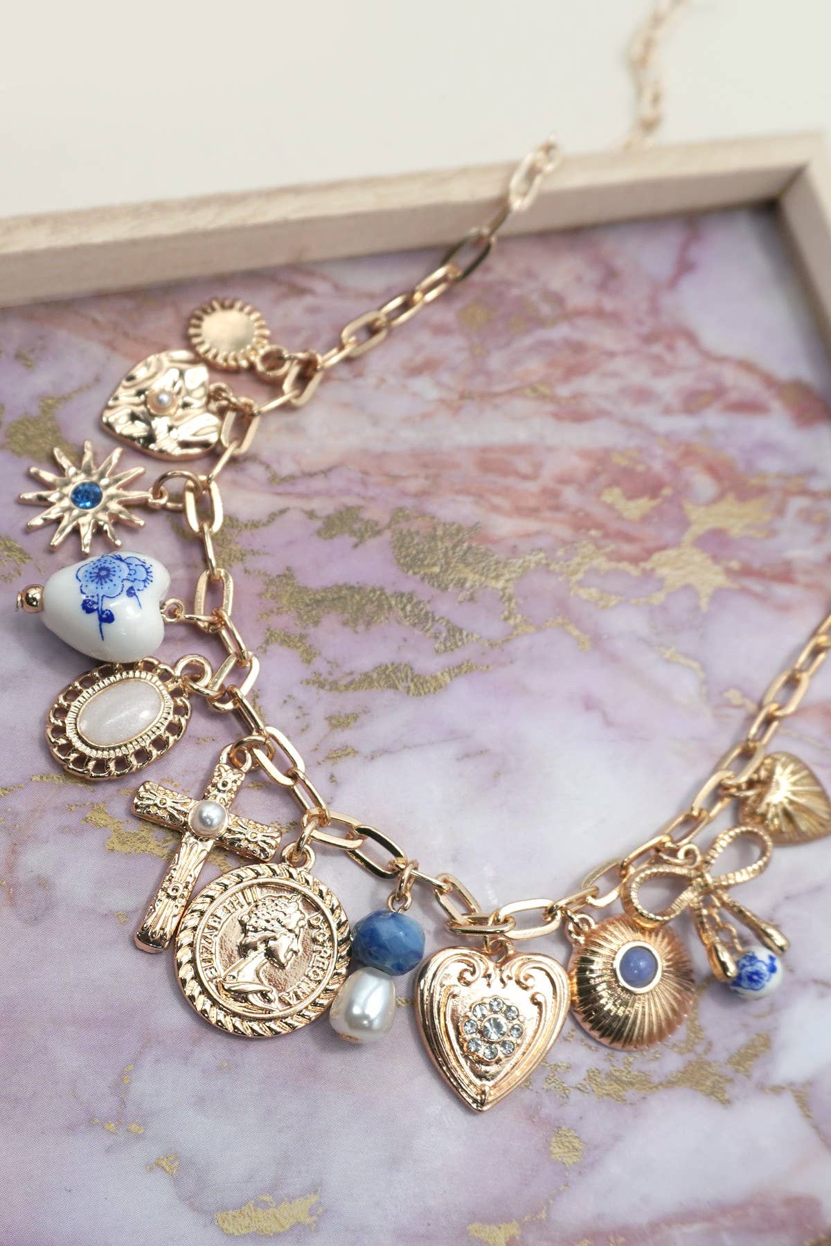 PORCELAIN HEARTS CROSS NECKLACE | 80N91593