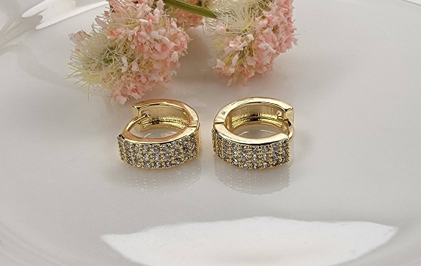 CZ SMALL CLICKER EARRINGS.