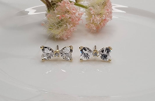 CZ BOW STUD EARRINGS.
