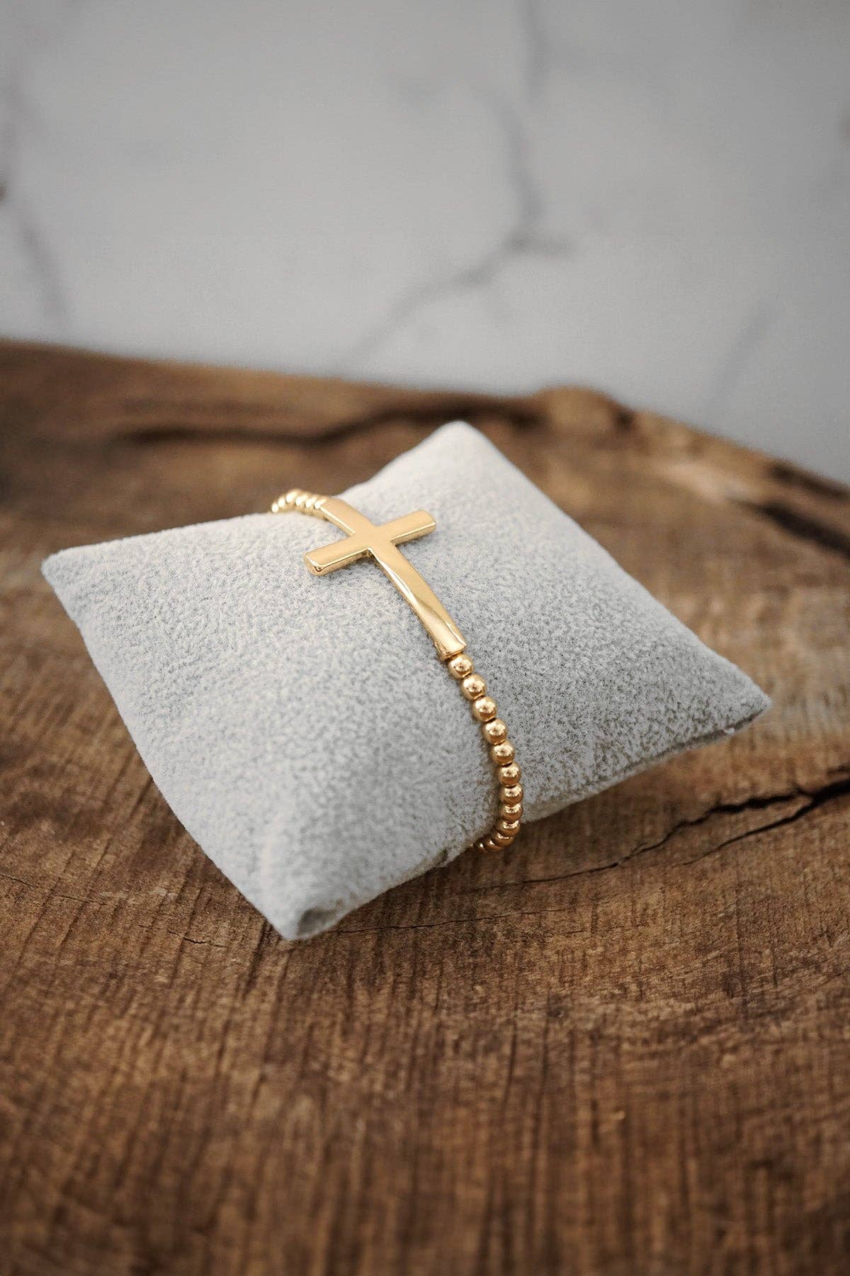 Worn Gold Cross Bracelet