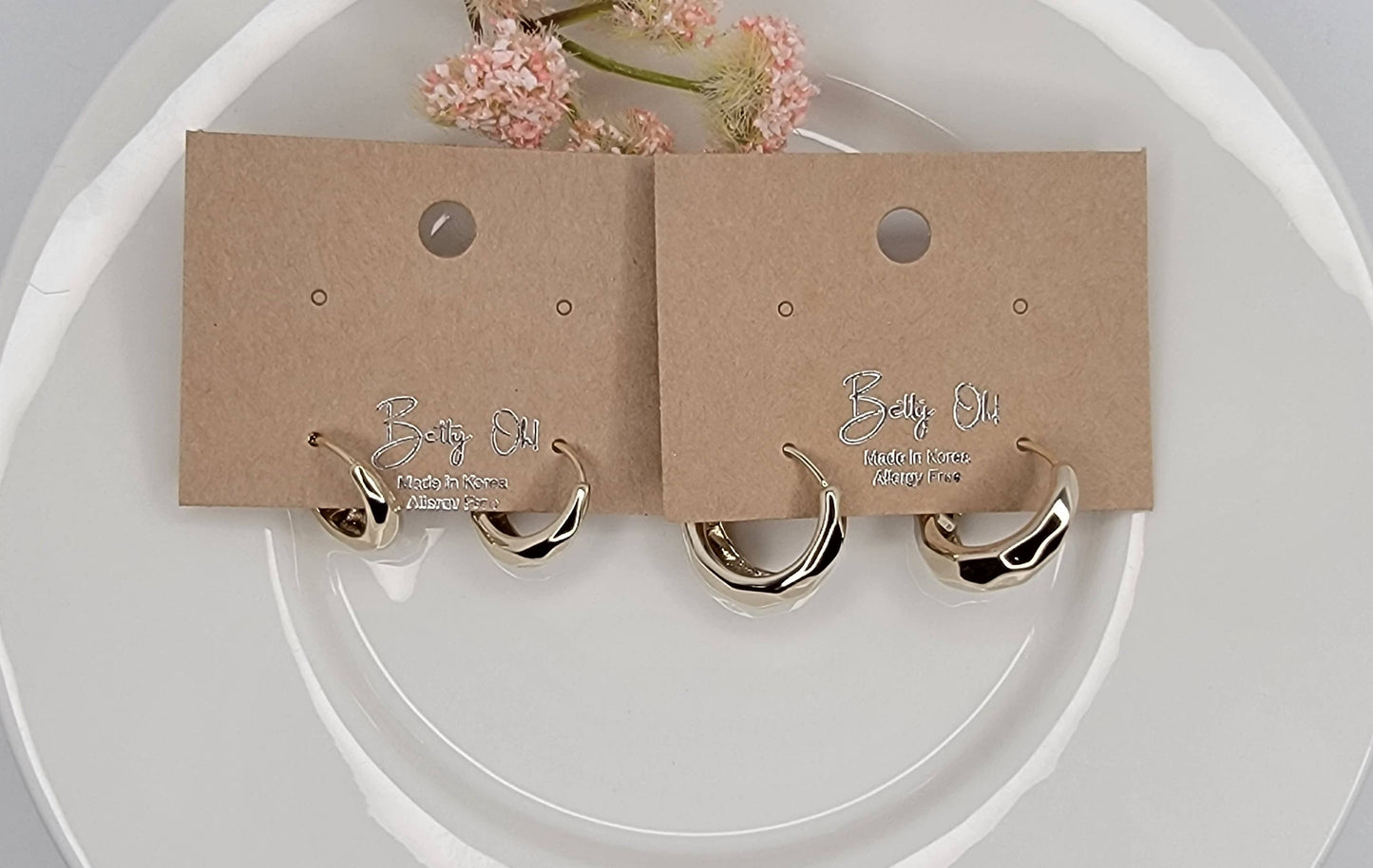 BEVELED HUGGIE EARRINGS.
