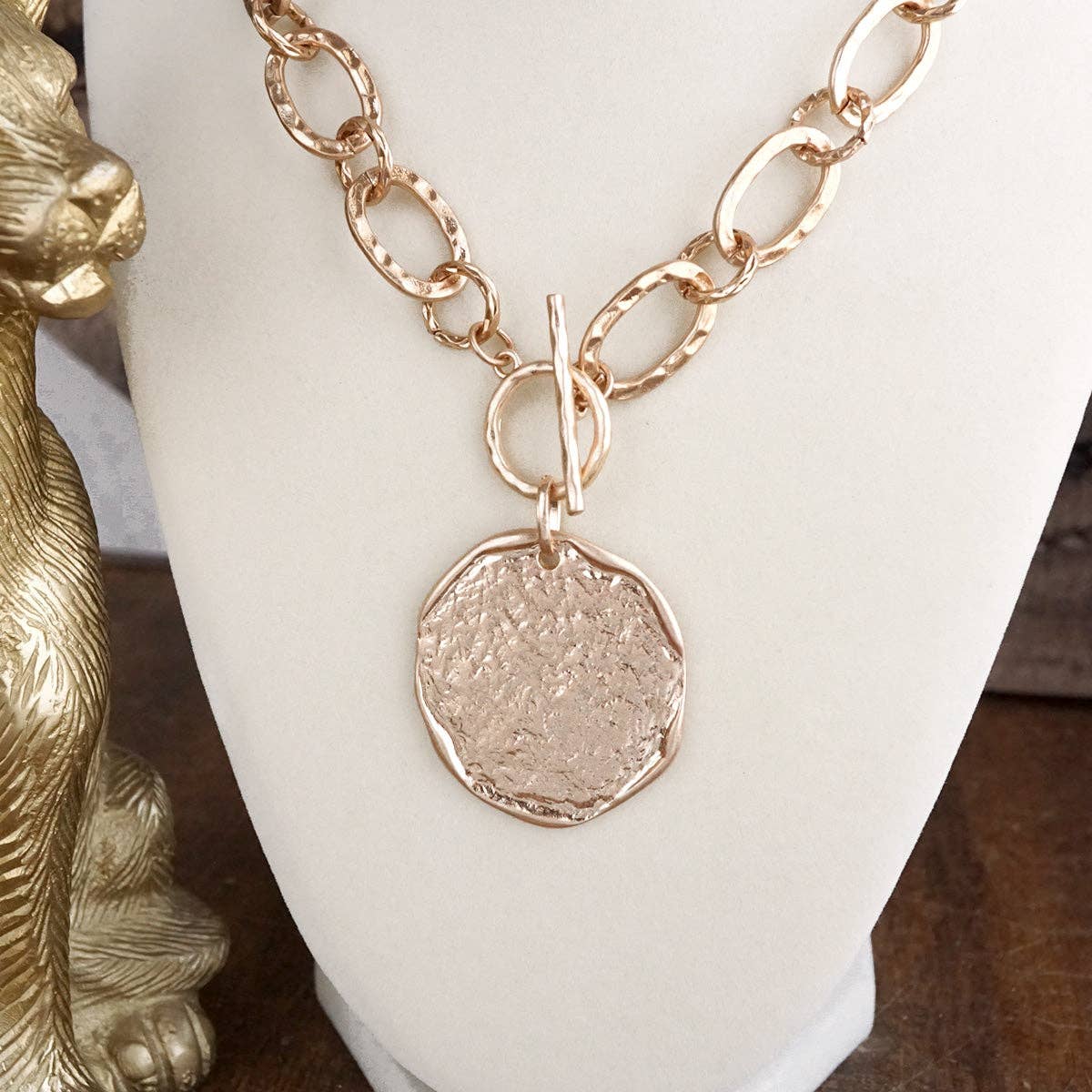 Nomad Glow – Front Toggle Statement Necklace with Hammered Disc