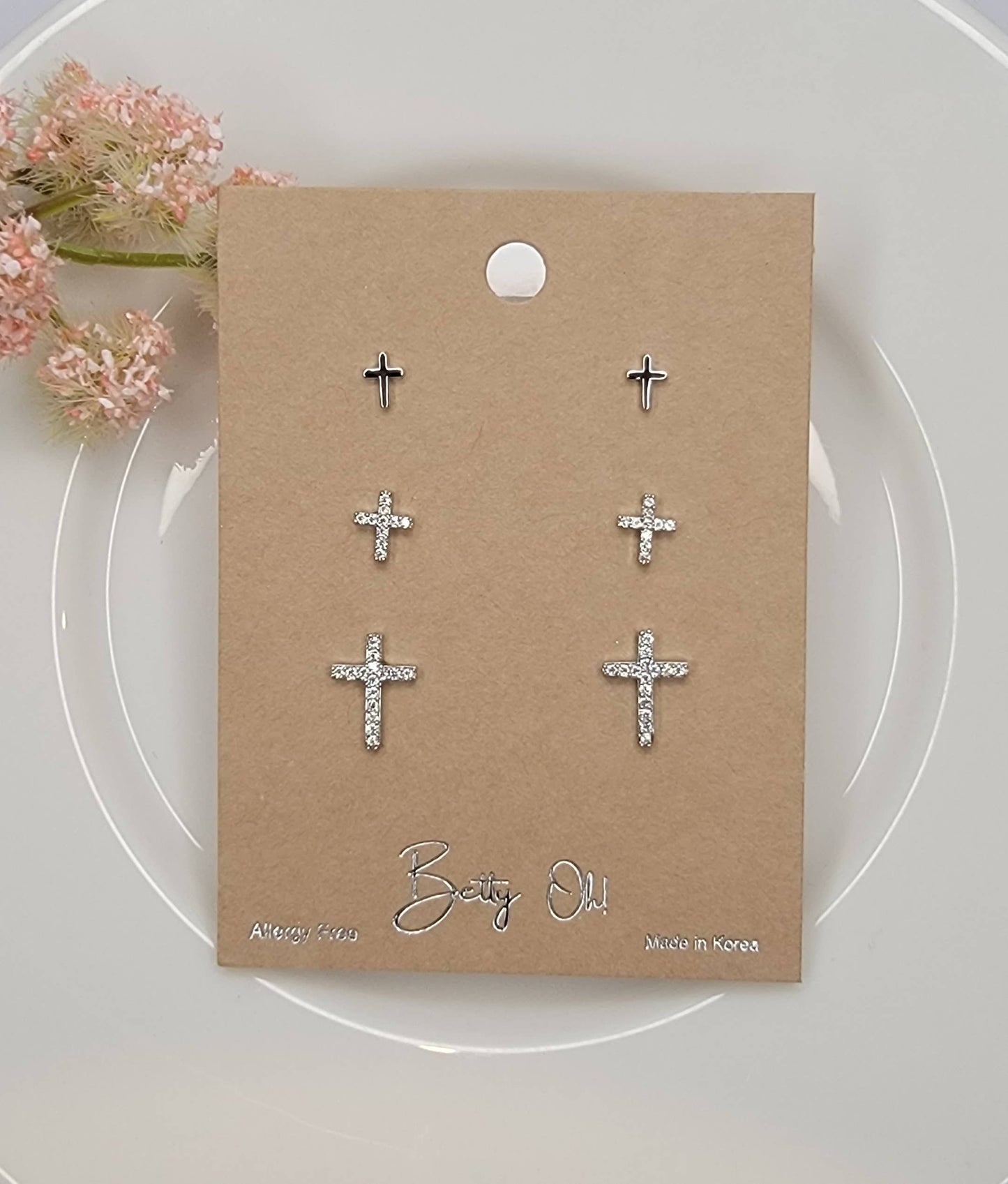MINI CROSS THREE PAIR SET POST EARRINGS.