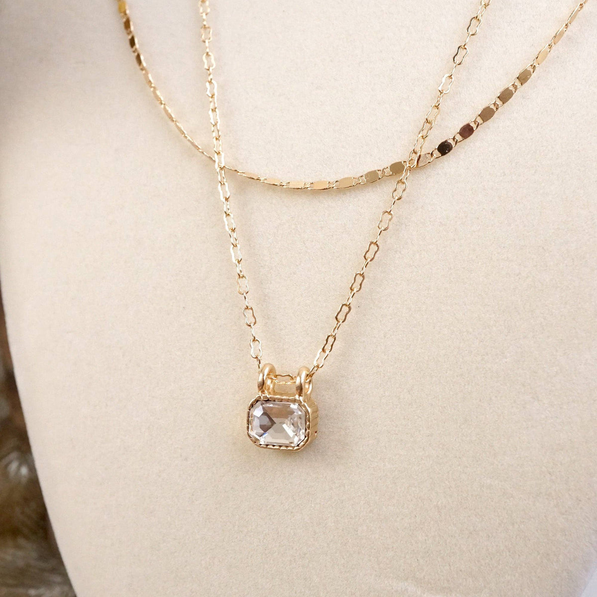 Glimmered Layers – Double Chain Necklace with Emerald-Cut Crystal