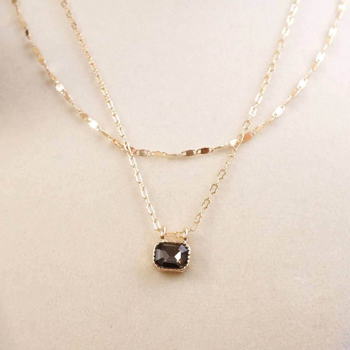 Glimmered Layers – Double Chain Necklace with Emerald-Cut Crystal