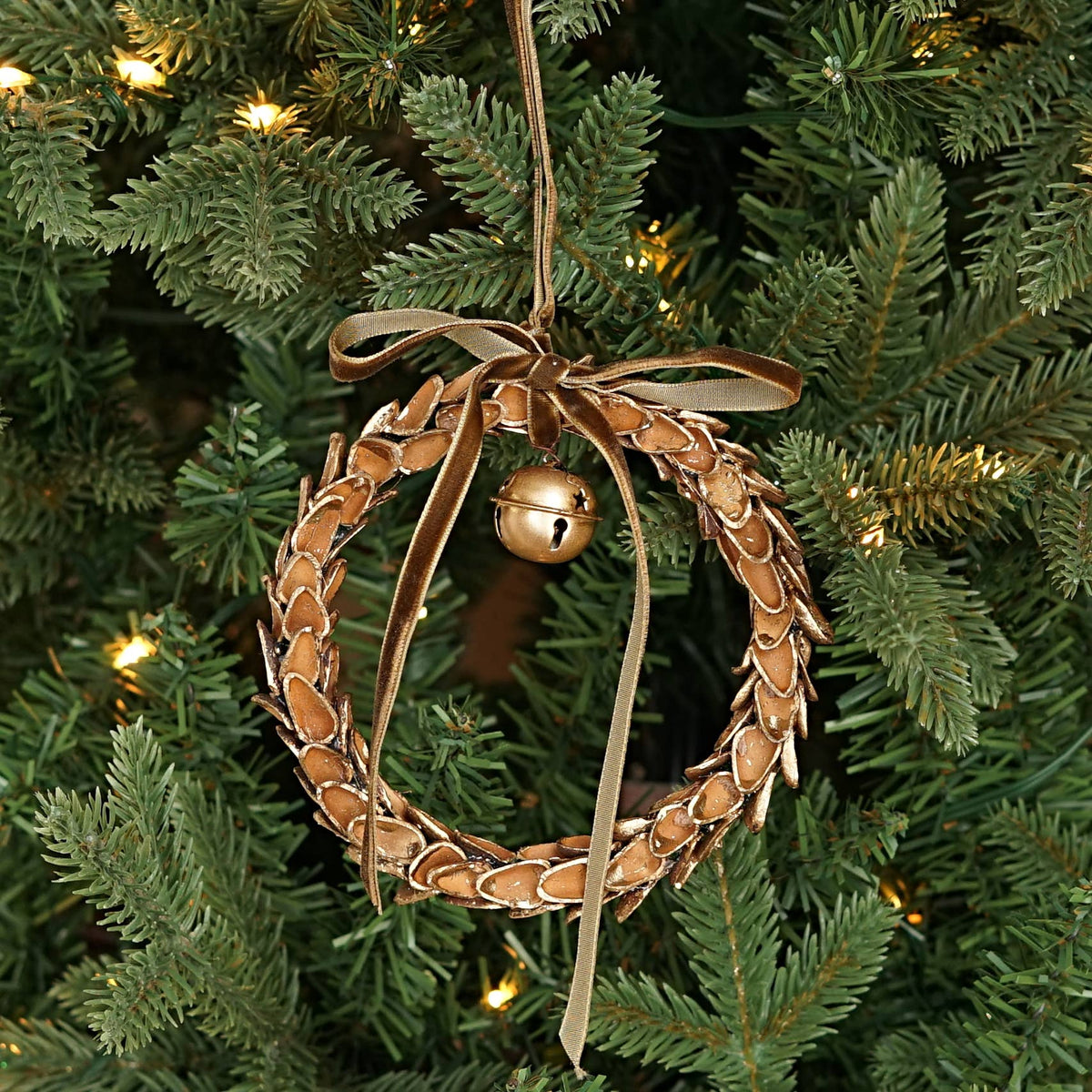 571037- 4.5inD Nut Shell Ring with Gold Bell and Brown ribbo