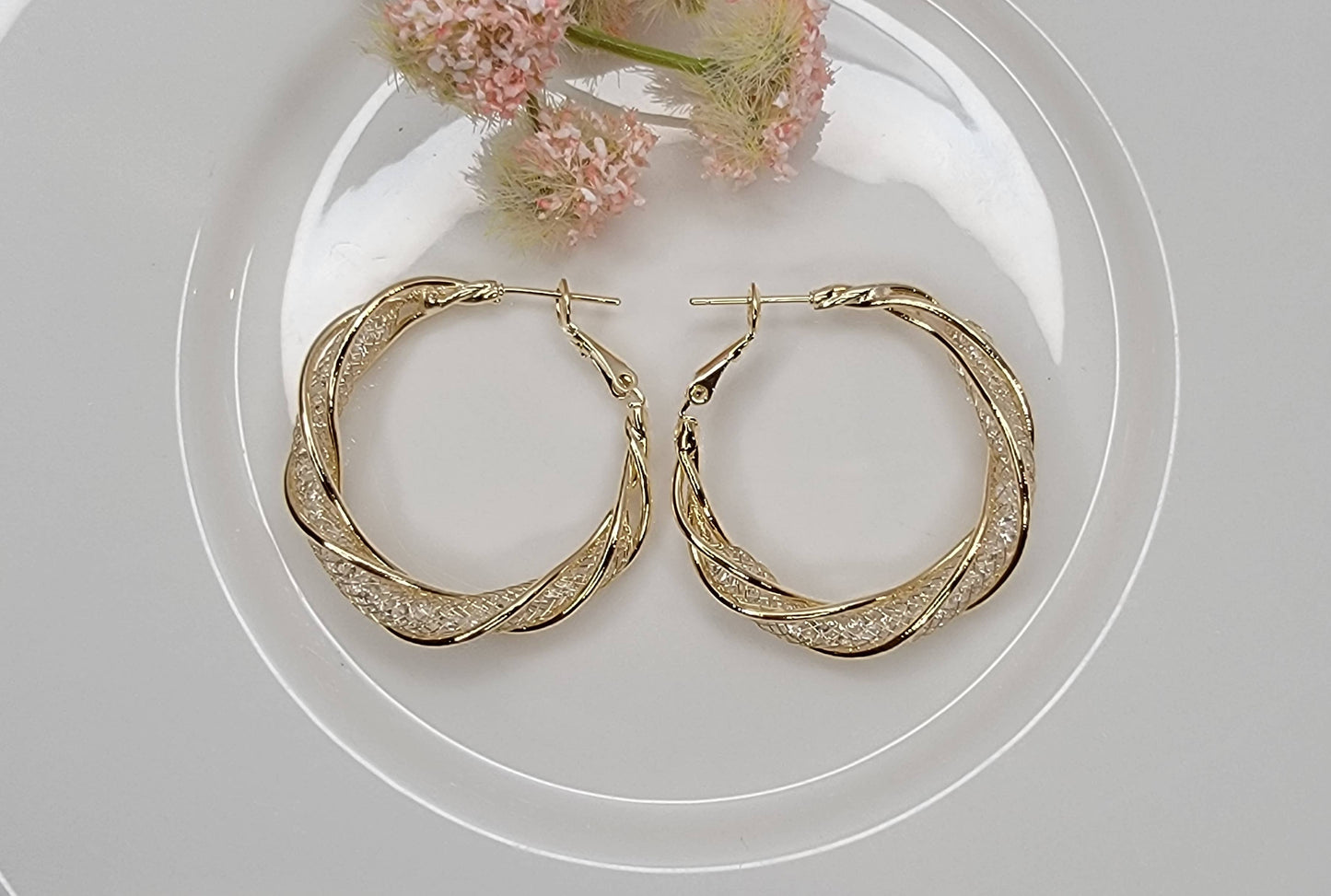 CRYSTAL BEADED FILLED TUBE GOLD HOOP EARRINGS.