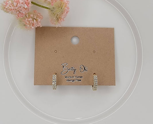 CZ CLICKER EARRINGS.
