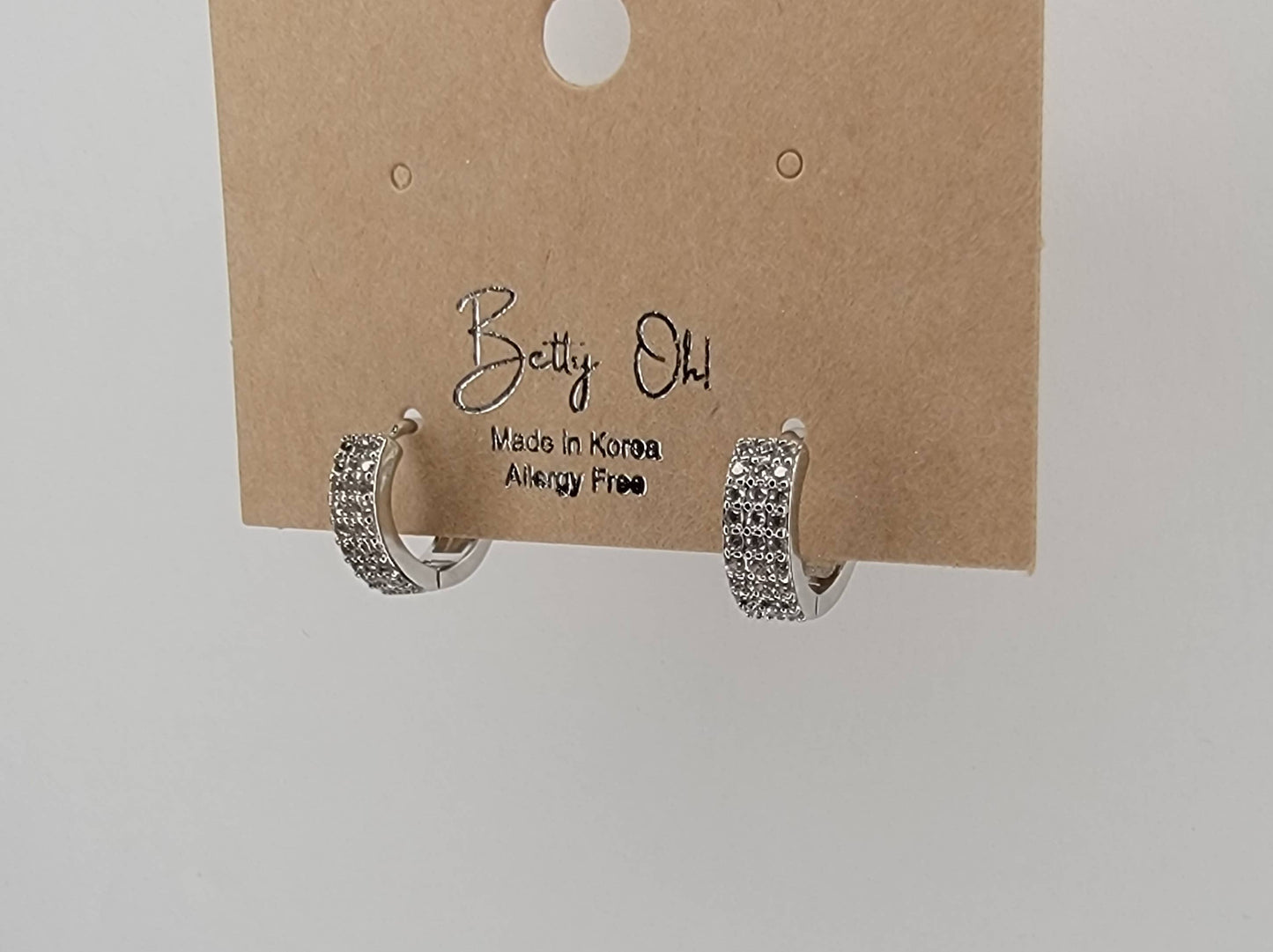 CZ SMALL CLICKER EARRINGS.
