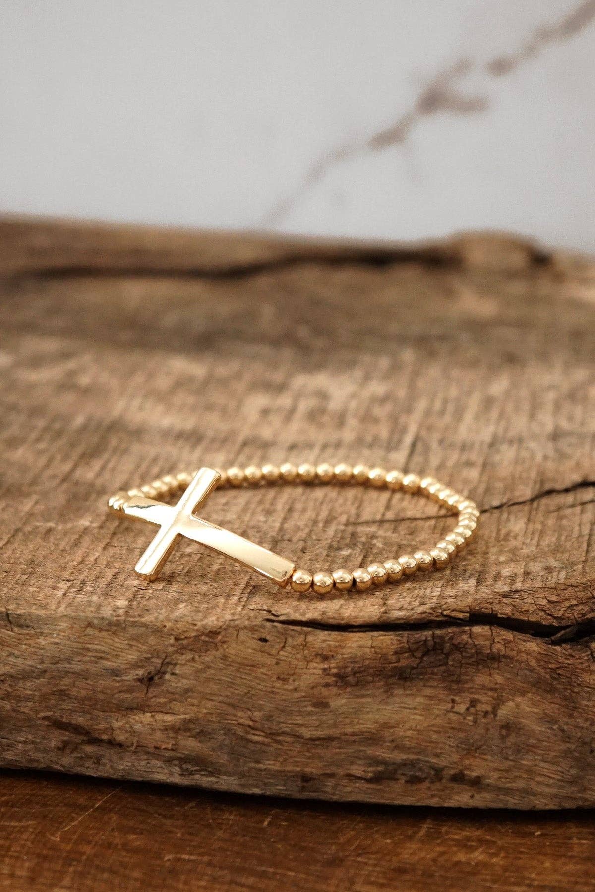 Worn Gold Cross Bracelet