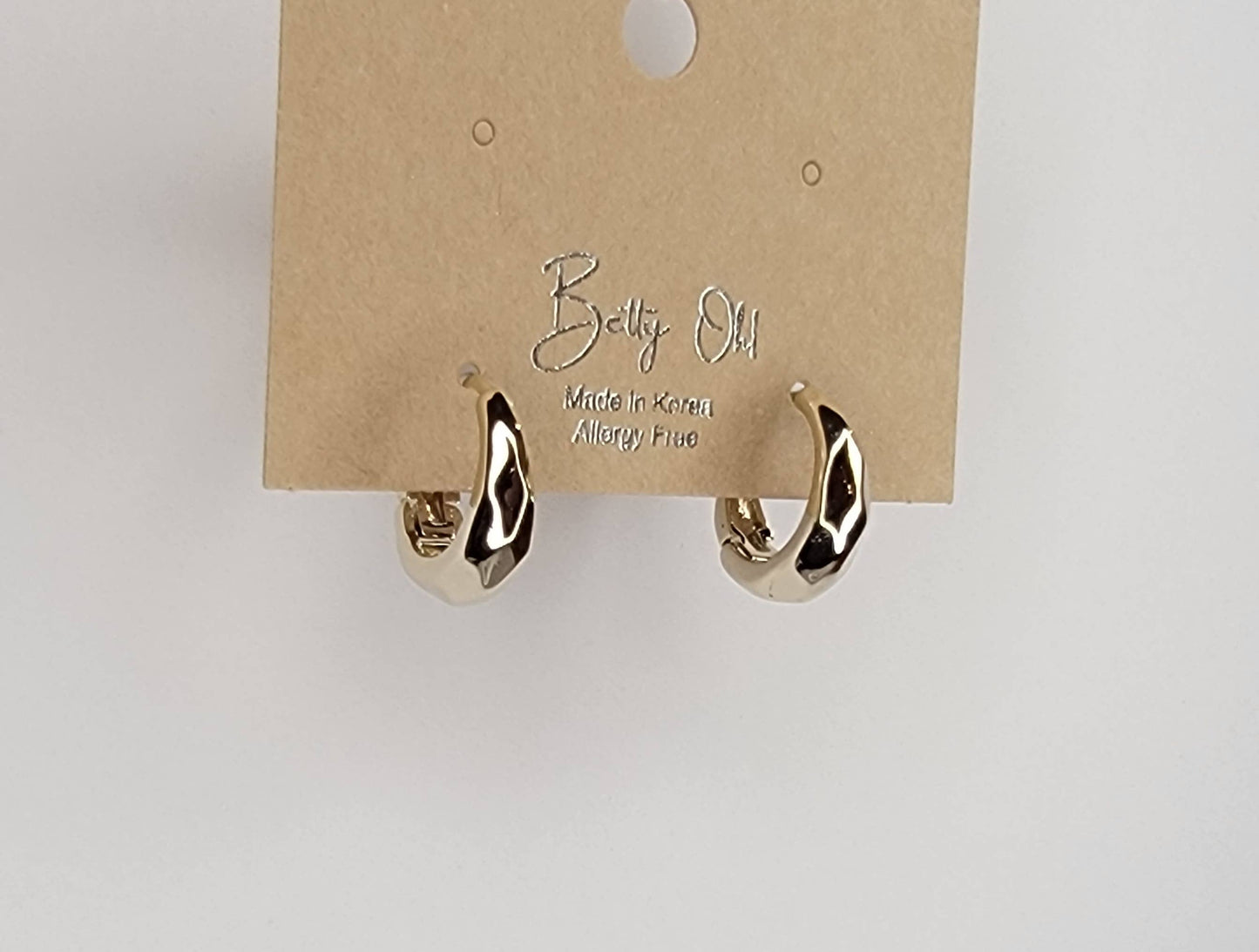 BEVELED HUGGIE EARRINGS.