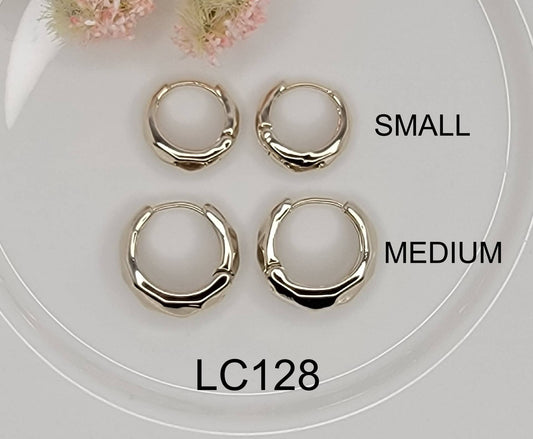 BEVELED HUGGIE EARRINGS.