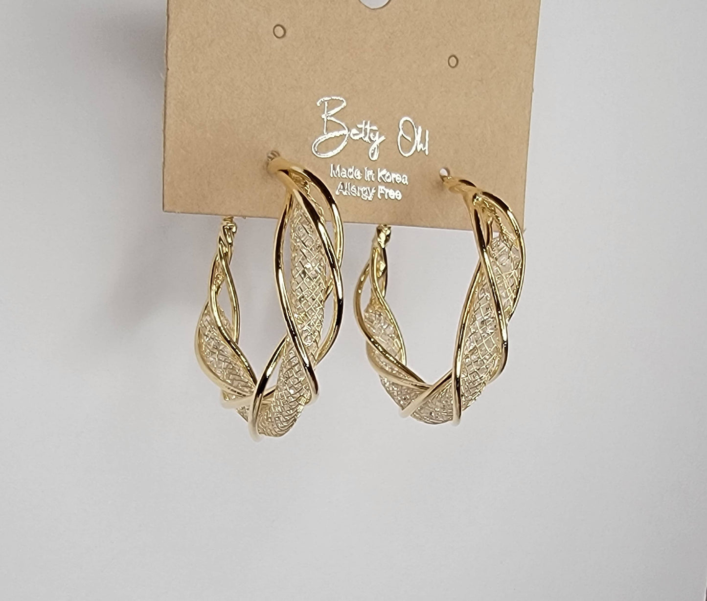 CRYSTAL BEADED FILLED TUBE GOLD HOOP EARRINGS.