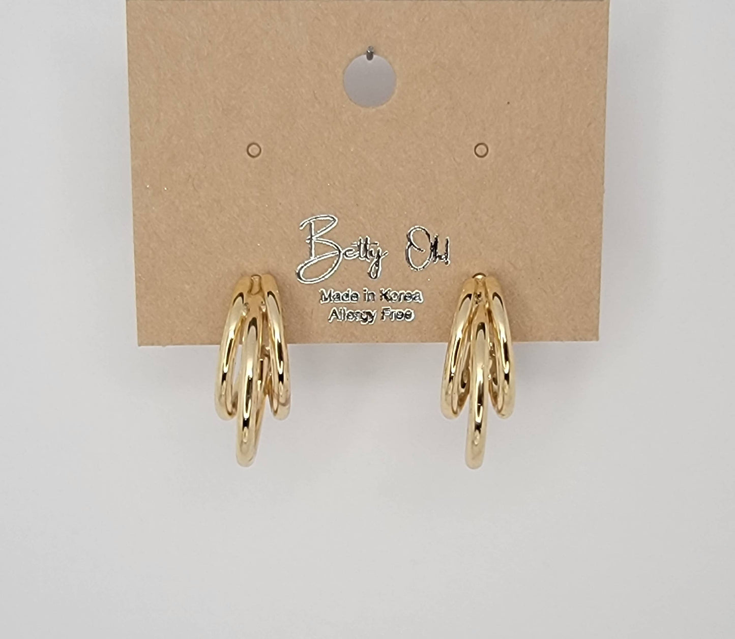 TRIPLE TUBE HOOP EARRINGS.