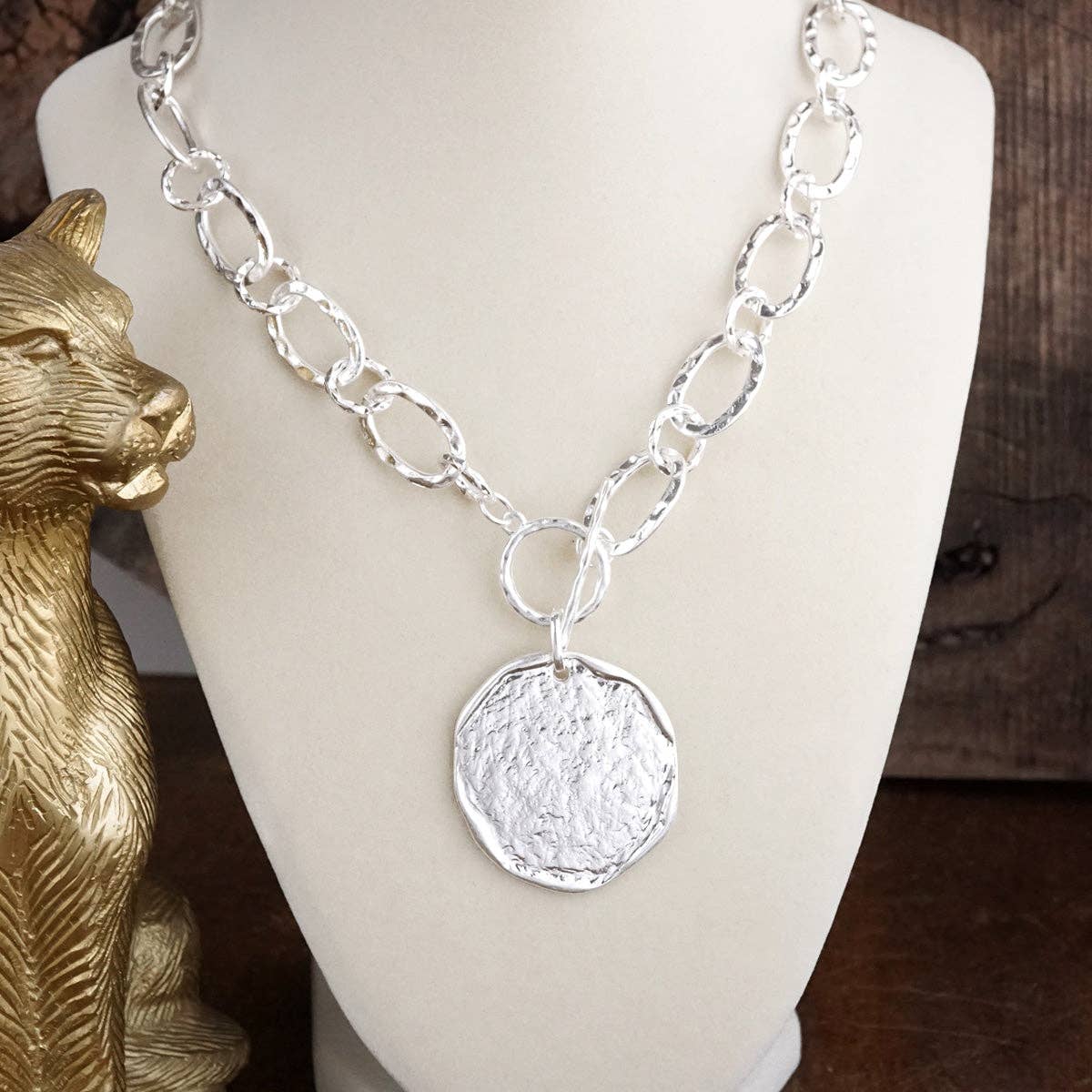 Nomad Glow – Front Toggle Statement Necklace with Hammered Disc
