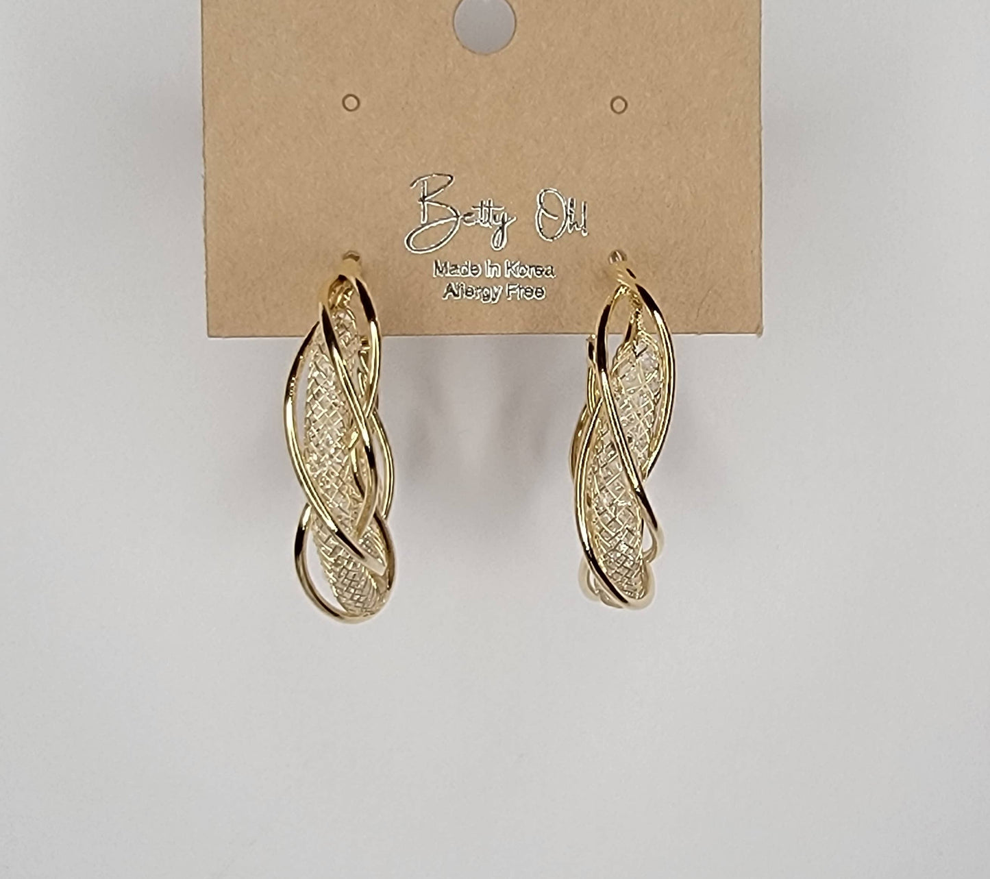 CRYSTAL BEADED FILLED TUBE GOLD HOOP EARRINGS.