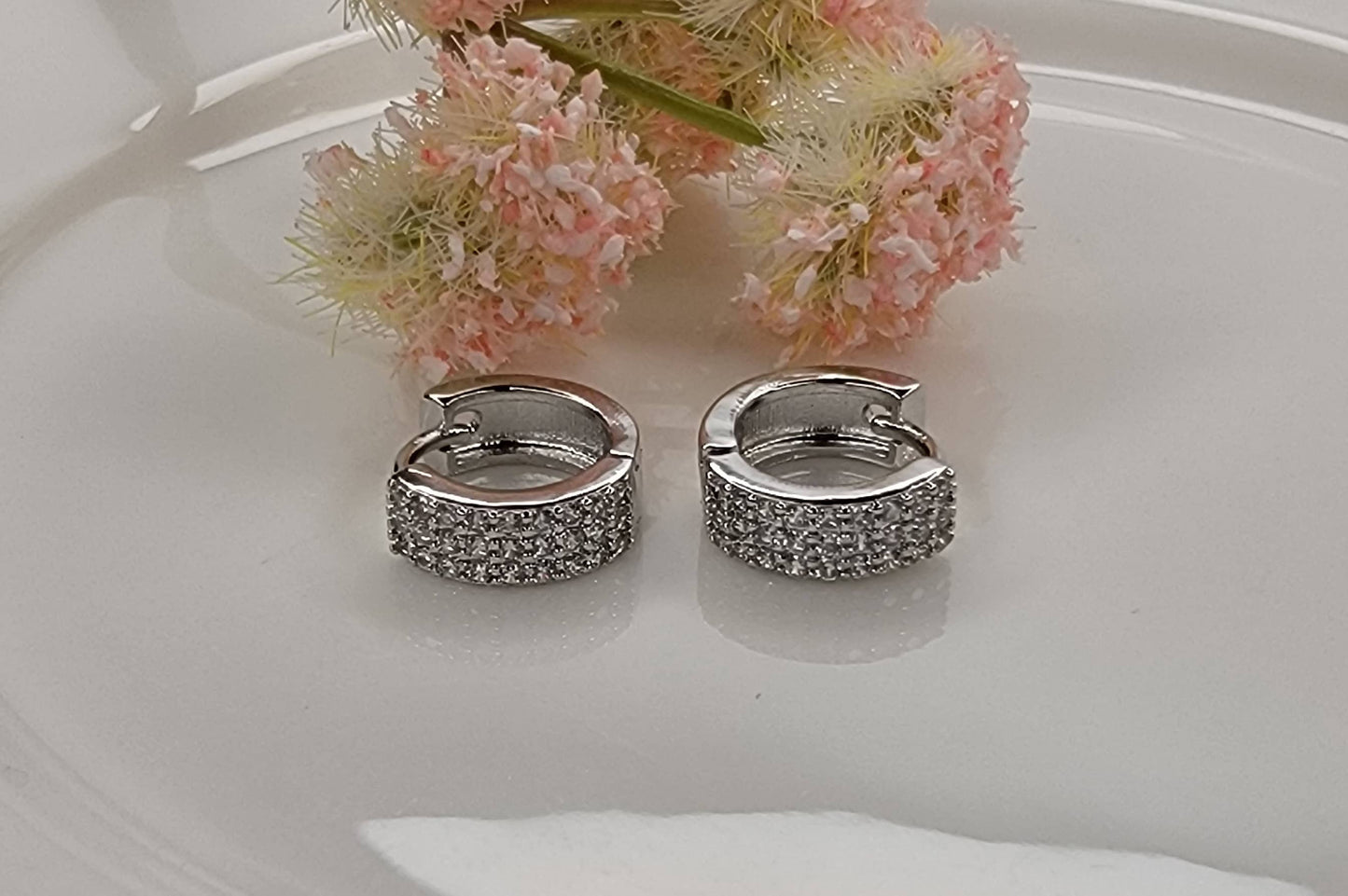 CZ SMALL CLICKER EARRINGS.